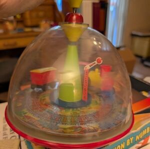 Vintage Spinning Top Toy with Train inside